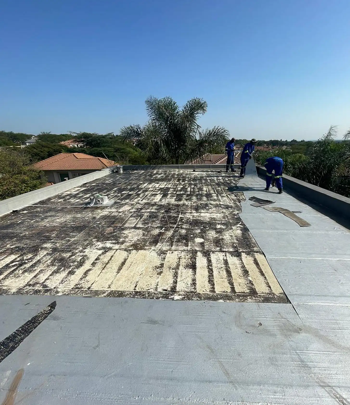 Inverted concrete roof without insulation and stone ballast