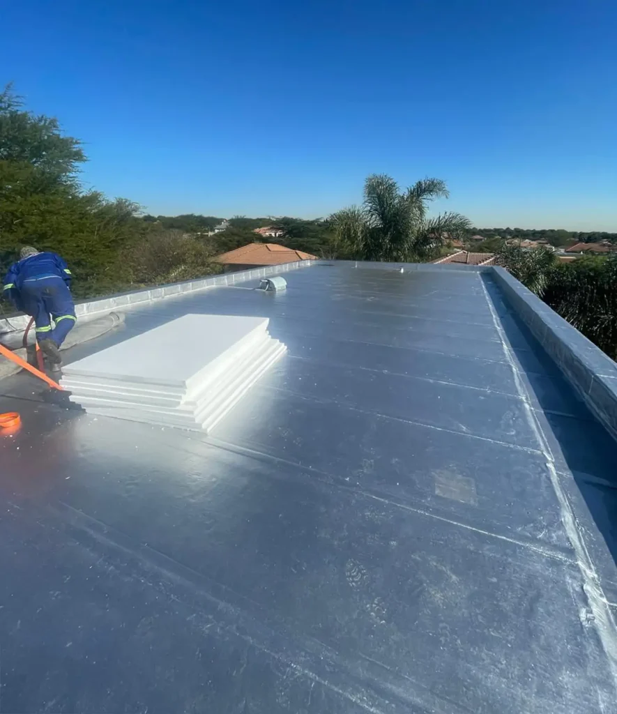 Protective aluminium coating is applied to protect the roof from African sun